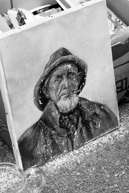 a black and white photo of a man in a hat, street art, covered in oil painting, fisherman, an oldman, low quality photograph