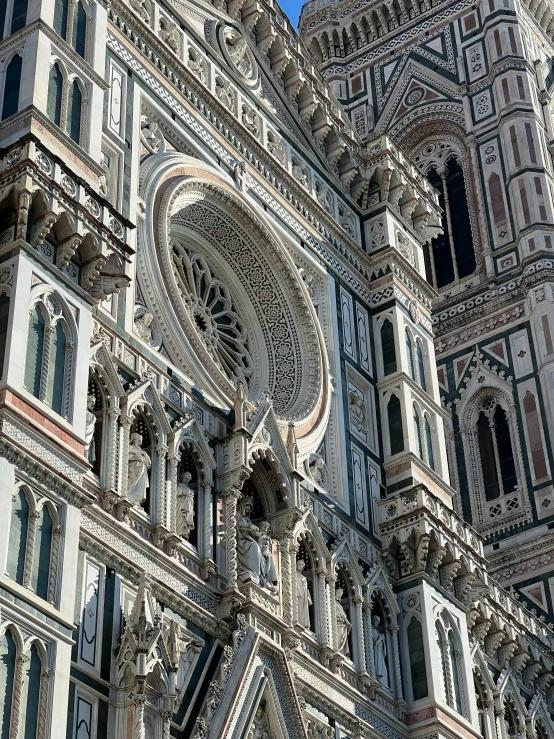 a very tall building with a clock on it's side, inspired by Duccio, pexels contest winner, renaissance, with great domes and arches, exterior view, detailing, florentine school