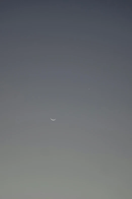 a plane that is flying in the sky, a picture, inspired by Jan Rustem, postminimalism, moon in his crown, !subtle smiling!, f / 1. 2 5, venus