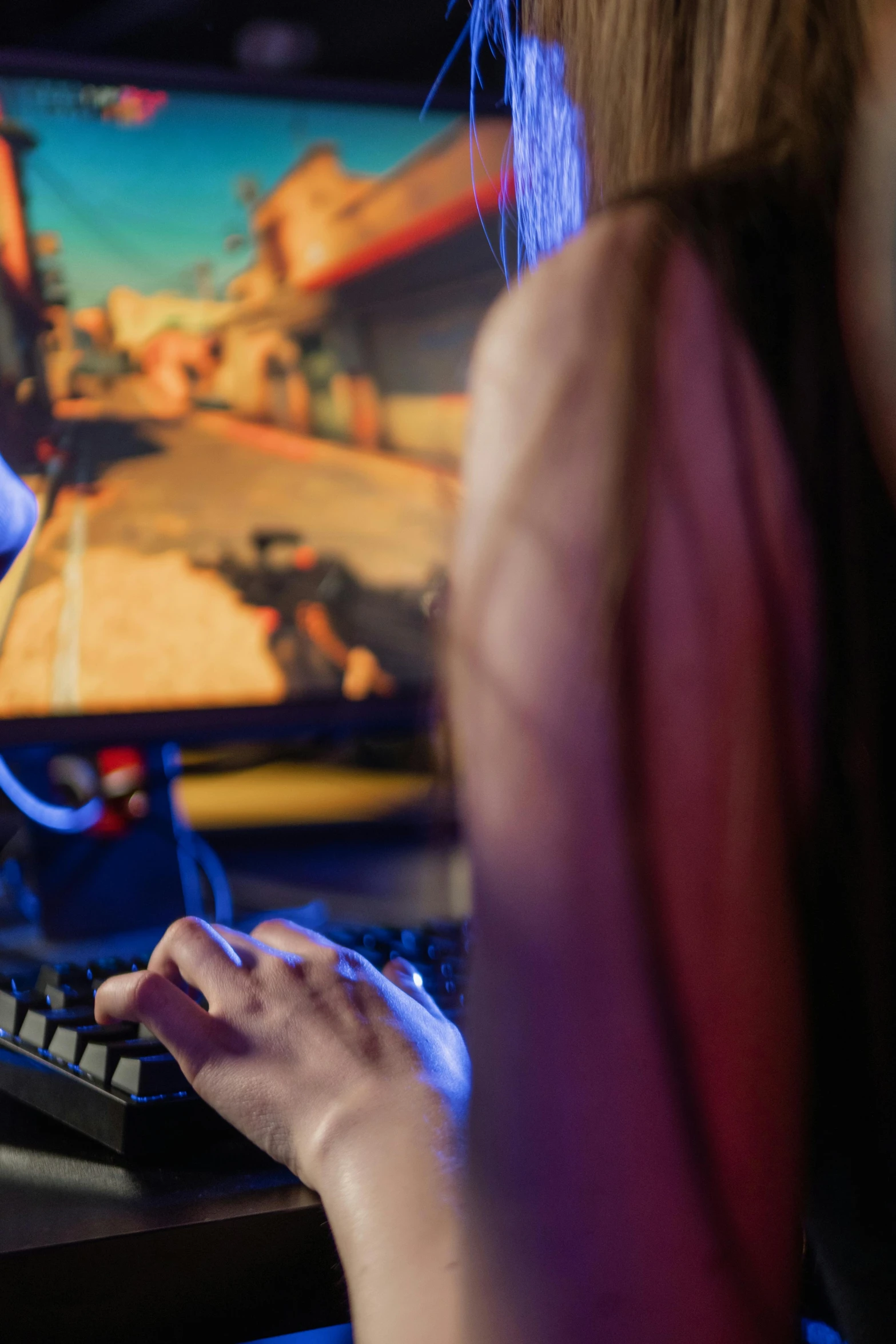 a woman playing a video game on a computer, by Dan Content, blizzard entertainment, up close shot, 2 5 6 x 2 5 6 pixels, fan favorite