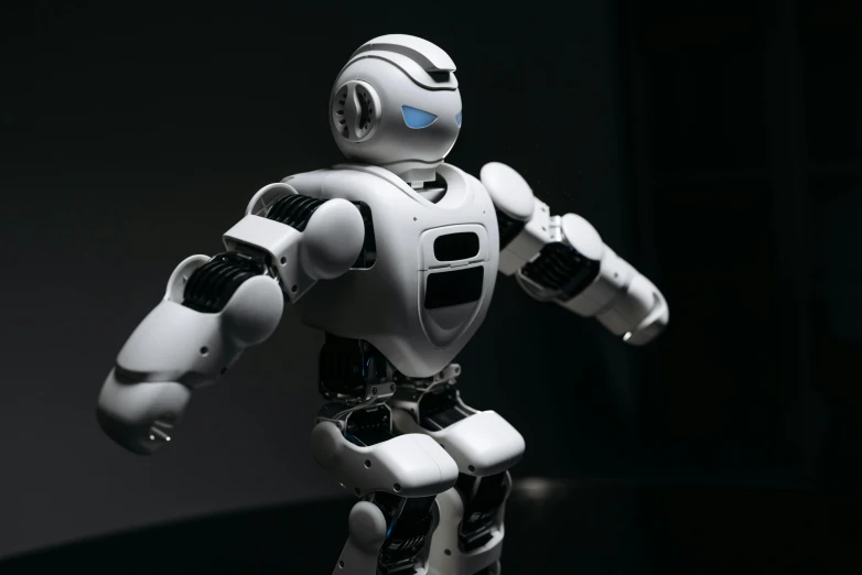 a close up of a toy robot on a table, mocap, powerful stance, photographed for reuters, good shading