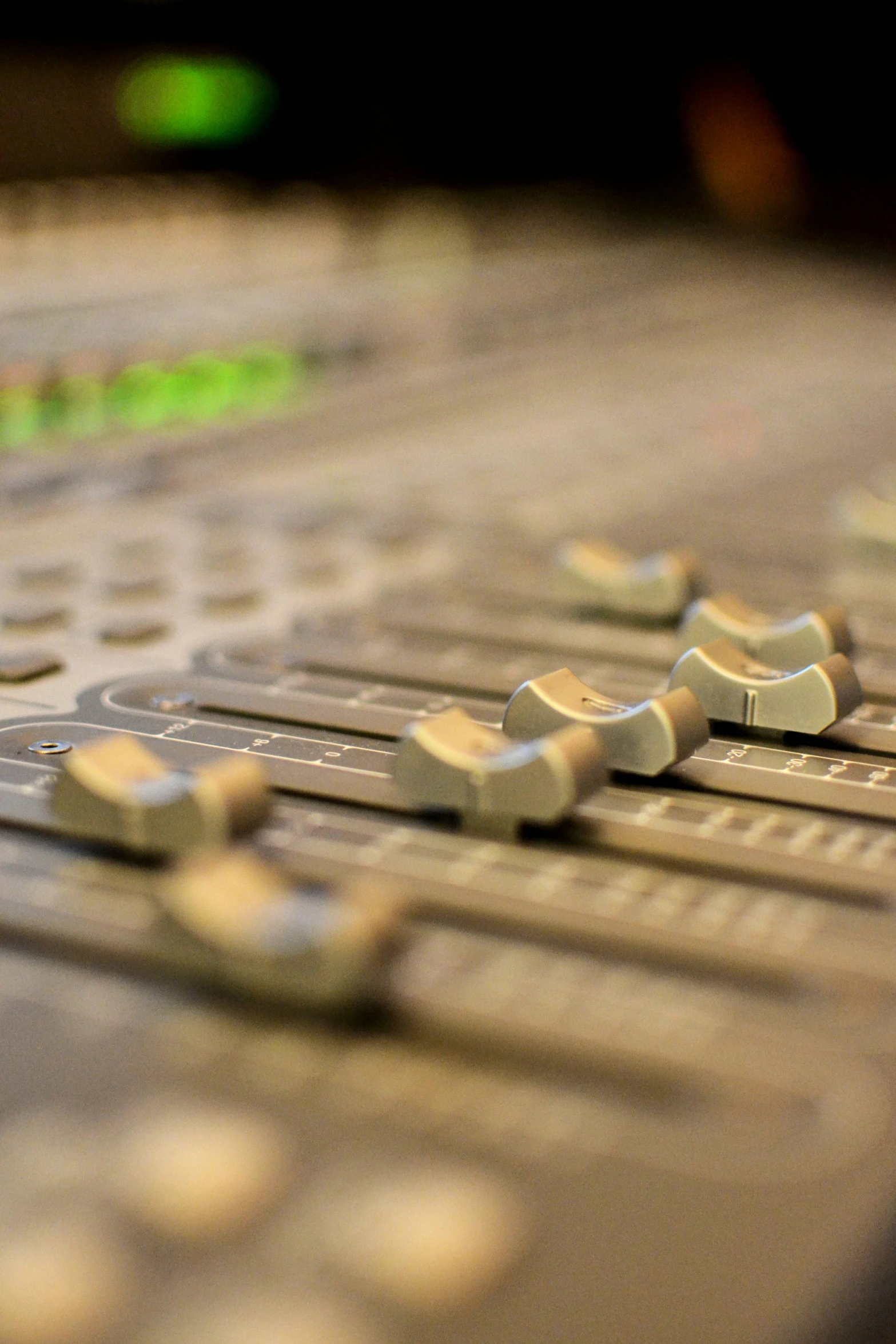 a close up of a control board in a recording studio, an album cover, by David Simpson, private press, ears, large array, theatre equipment, in a row