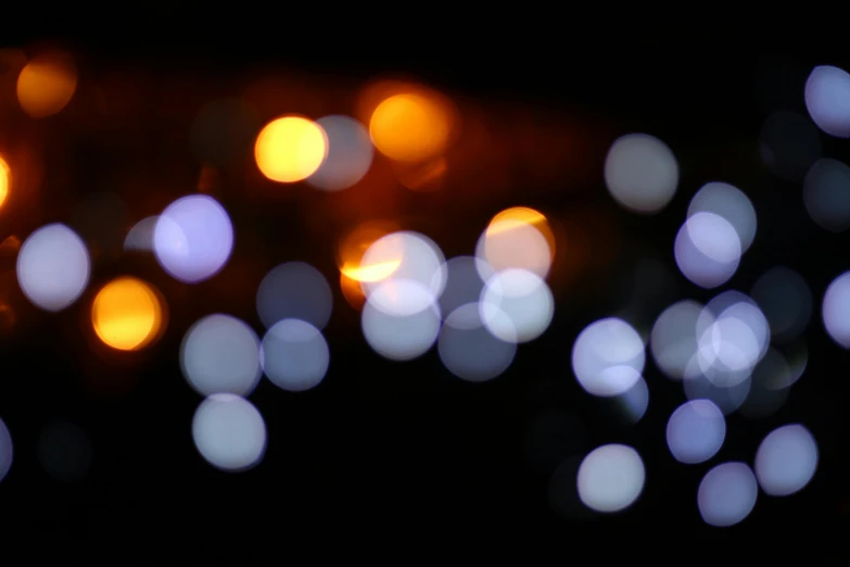 a bunch of lights that are in the dark, by Tom Bonson, unsplash, overcast bokeh - c 5, blue and orange rim lights, white lights, overcast bokeh - c 8