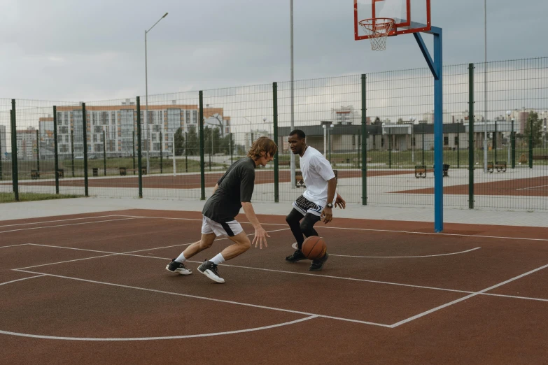 two men playing a game of basketball on a court, by Attila Meszlenyi, trending on dribble, 15081959 21121991 01012000 4k