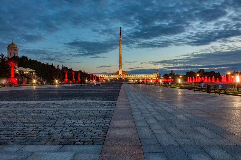 a view of the washington monument at night, an album cover, by Julia Pishtar, pexels contest winner, socialist realism, ground level view of soviet town, panorama, square, late morning