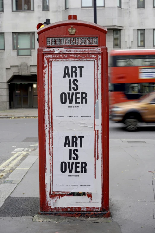 a red telephone box sitting on the side of a street, poster art, by Damien Hirst, street art, artforum, overblown, easel, but slower in changing