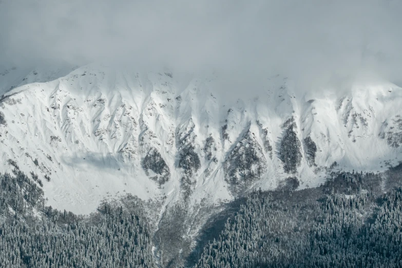 a snow covered mountain on a cloudy day, pexels contest winner, whistler, fan favorite, extreme panoramic, vertical wallpaper