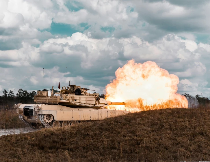 a tank that is sitting in the grass, by Brad Holland, unsplash contest winner, explosive entrance, panoramic shot, instagram story, action photography