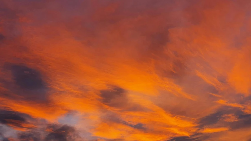 a plane is flying in the sky at sunset, by Jan Rustem, pexels contest winner, romanticism, fiery red, panorama view of the sky, dramatic brushstrokes, new mexico