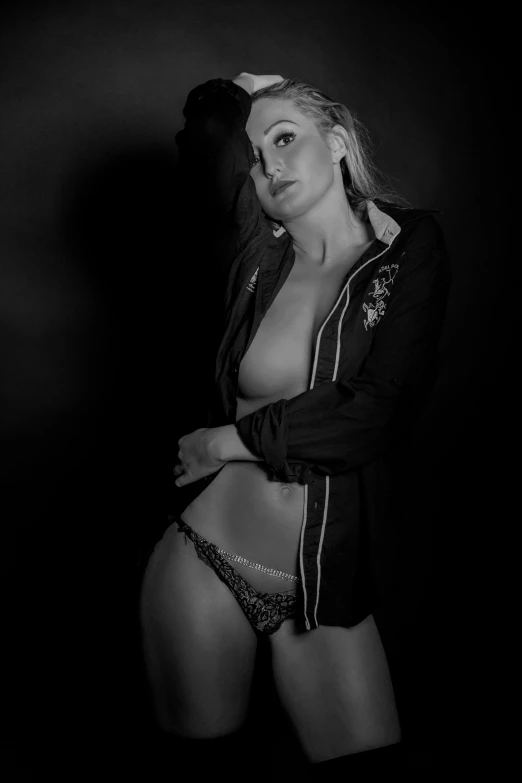 a black and white photo of a woman in lingerie, a black and white photo, by Dave Melvin, she wears leather jacket, deviantart artstation cgscosiety, blonde woman, daisy dukes
