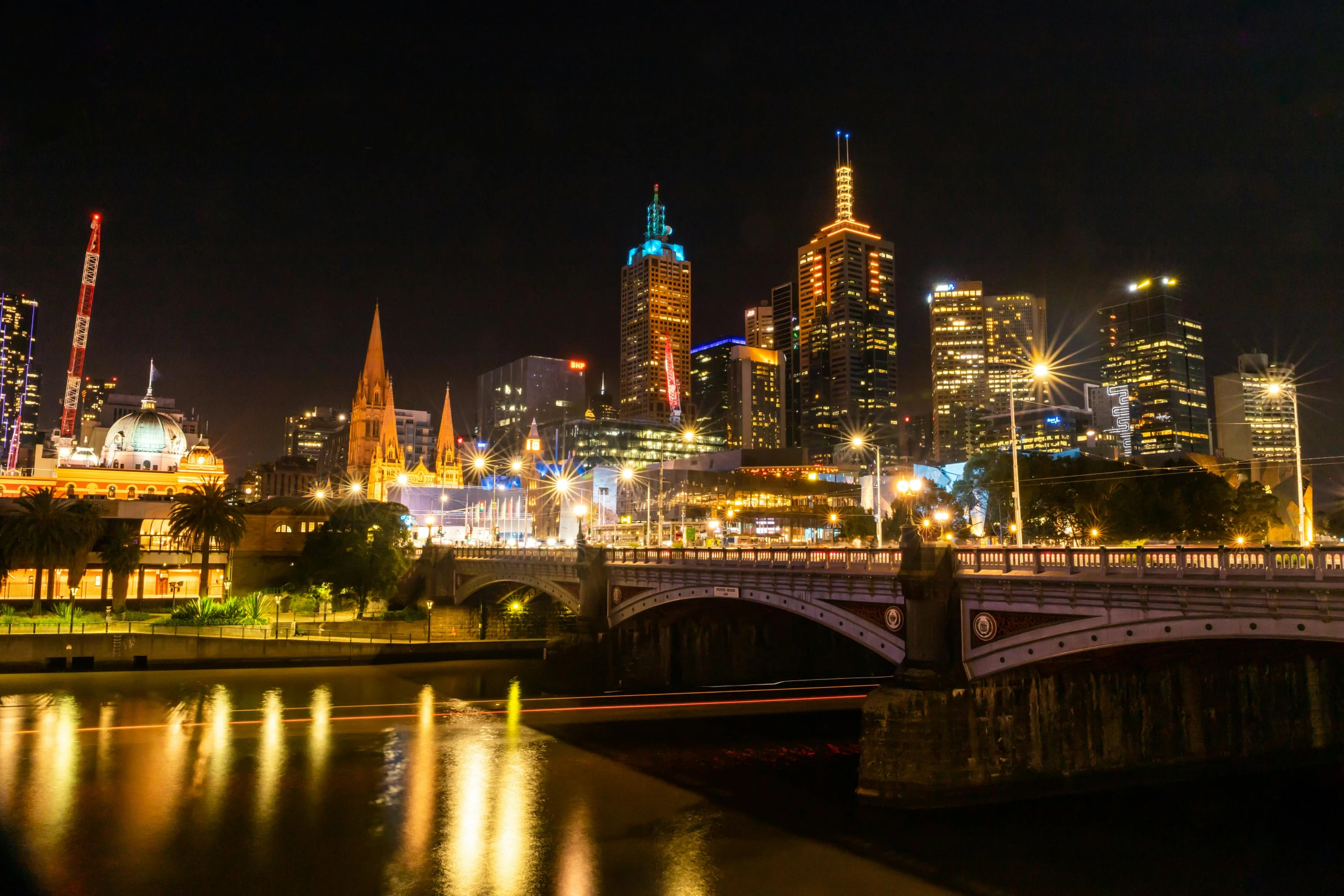 a view of a city at night from across the river, by Liza Donnelly, pexels contest winner, renaissance, north melbourne street, gigapixel photo, background image