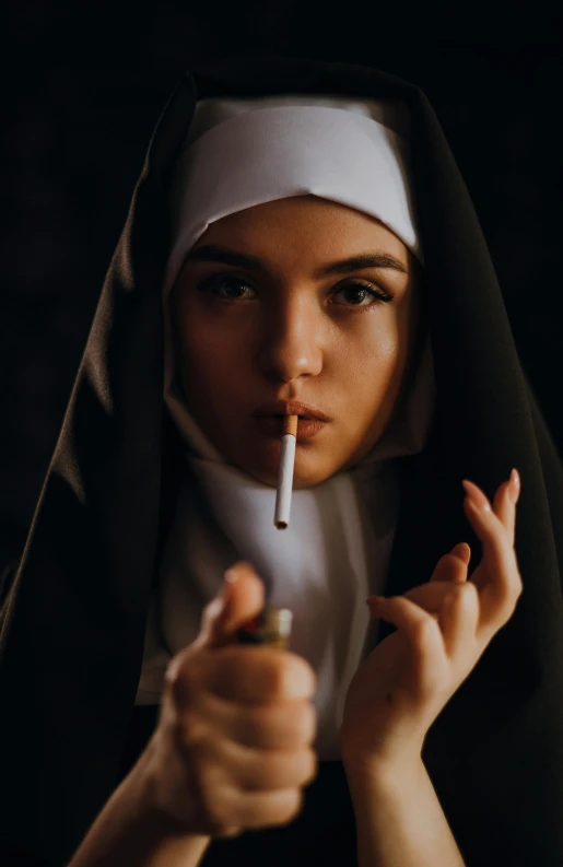 a woman with a cigarette in her hand, an album cover, inspired by Elsa Bleda, shutterstock, two hovering twin nuns, ( ( theatrical ) ), teenager girl, high quality photo