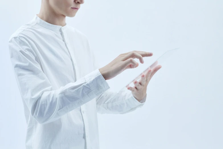 a man in a white shirt holding a tablet, inspired by Fei Danxu, analytical art, clear outfit design, dezeen, doctor, smooth surface