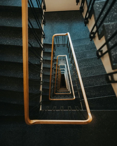 a set of stairs leading up to the top of a building, pexels contest winner, hypermodernism, non-binary, swirling around, thumbnail, trending on vsco