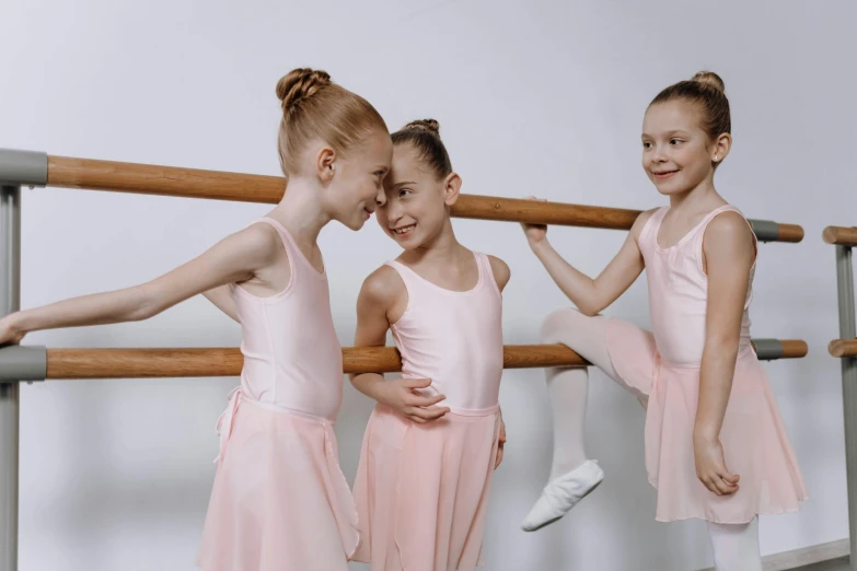 a group of young girls standing next to each other, pexels contest winner, arabesque, wearing leotard, thumbnail, 15081959 21121991 01012000 4k, zoomed in