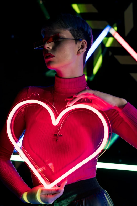 a woman in a red top holding a neon heart, inspired by David LaChapelle, trending on pexels, holography, fashion shoot, nightlife, lesbians, shades