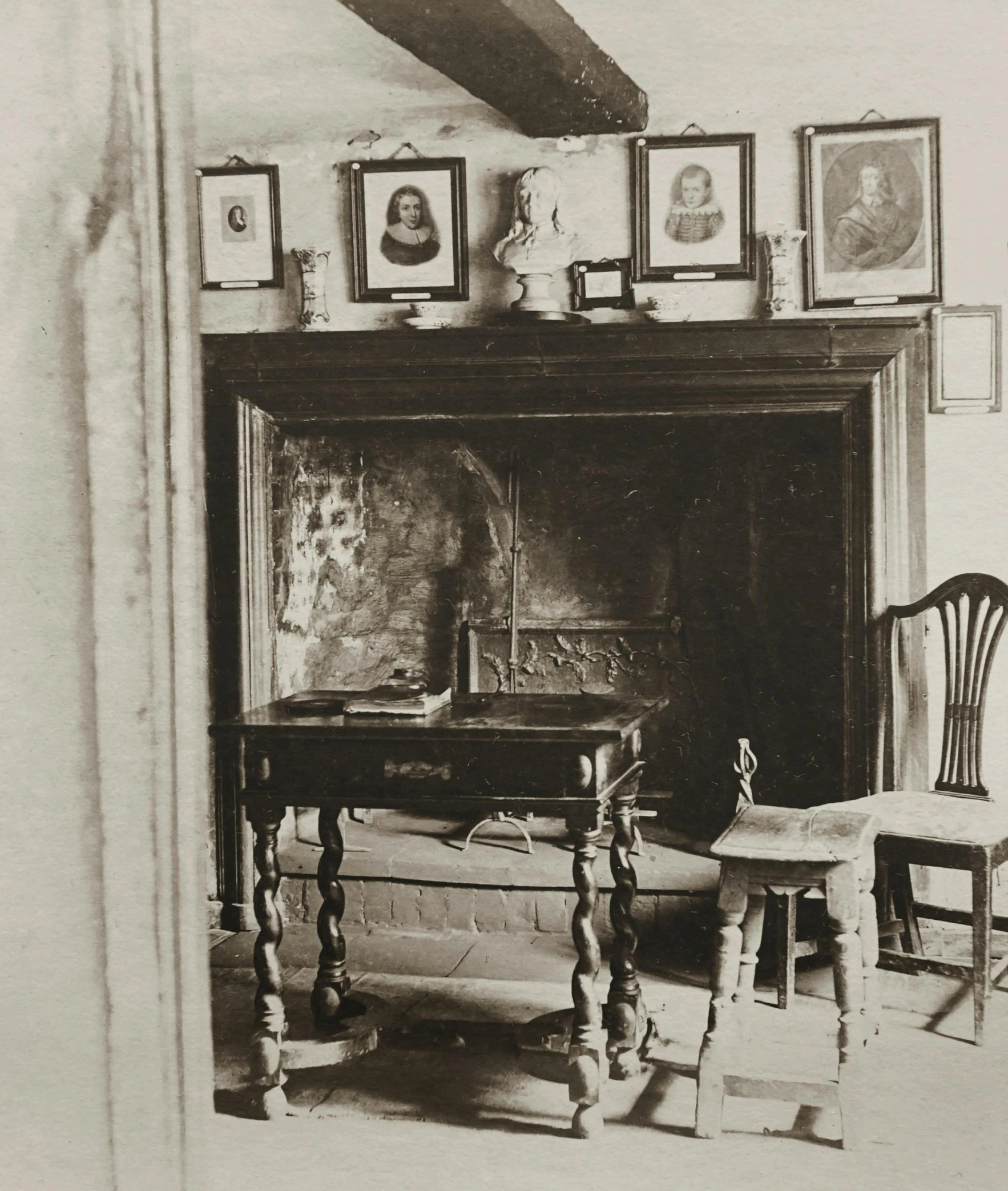 a black and white photo of a living room with a fireplace, an engraving, by David Octavius Hill, portrait of small, closeup photograph, album, lot of details