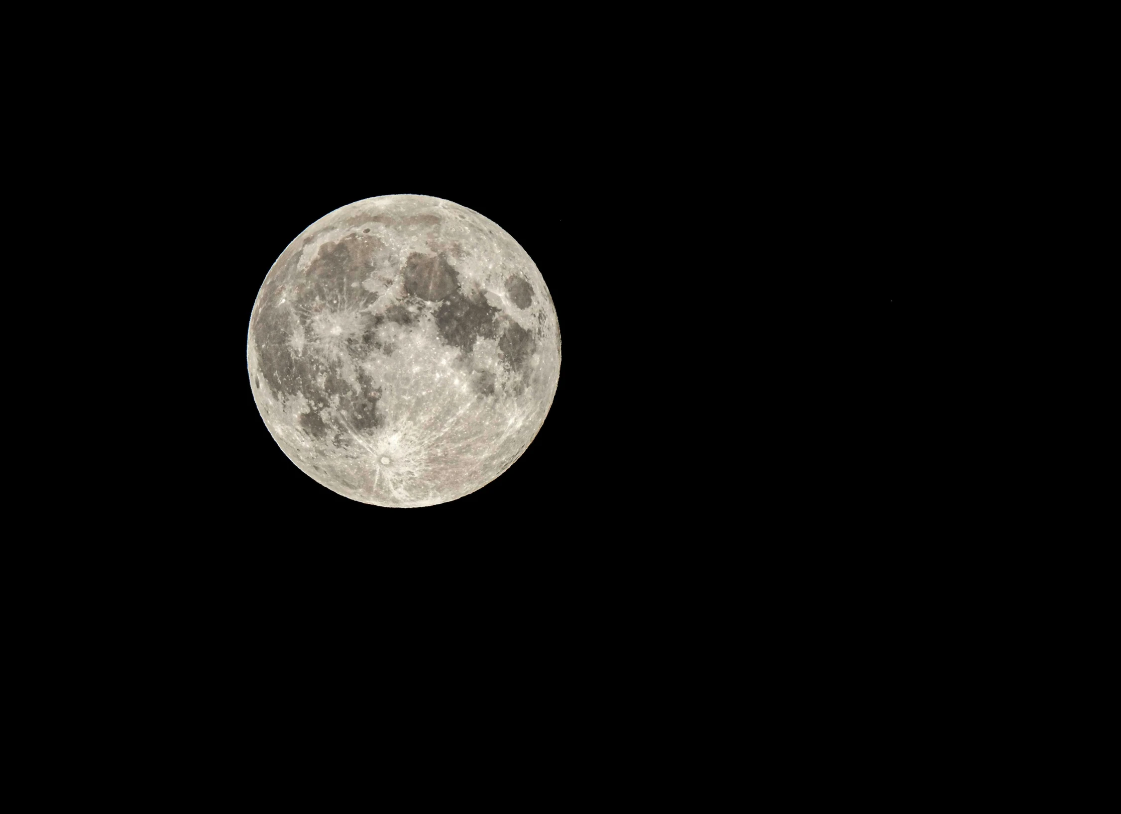 a full moon is seen in the dark sky, by David Simpson, pexels, # nofilter, high contrast!!, ✨🕌🌙, jupiter moon mars