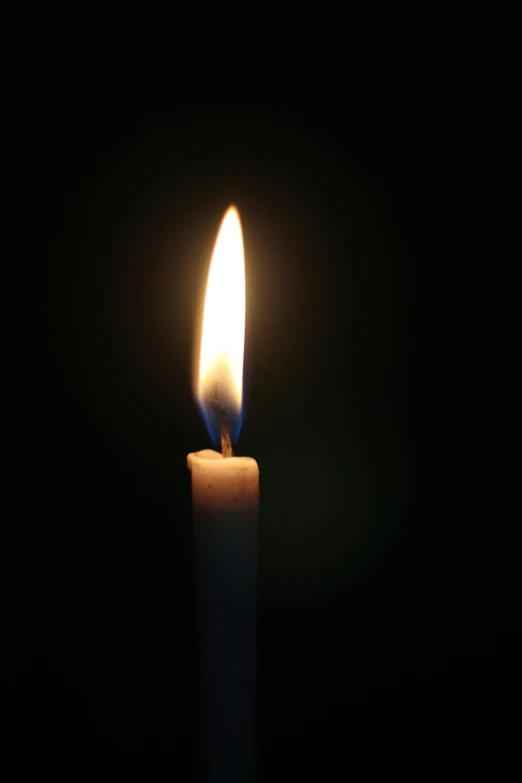 a single lit candle in the dark, by Joe Stefanelli, may 1 0, pillar, long, picture