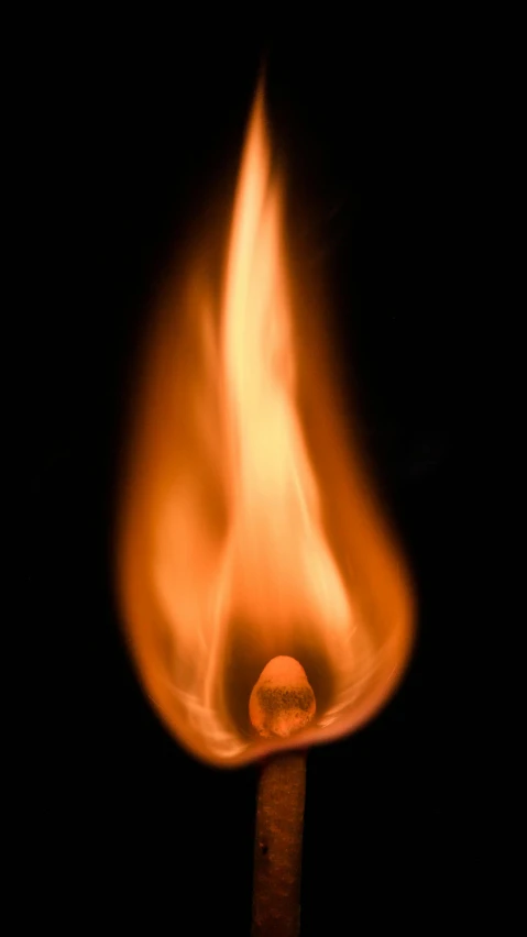 a burning matchstick on a black background, by Greg Rutkowski, pexels, tear drop, kodak photo, getty images, molten glass