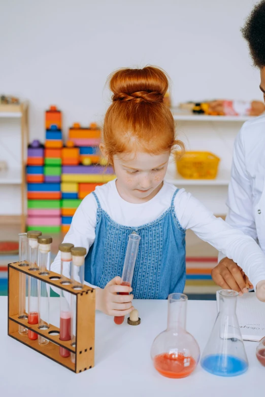 a woman teaching a child how to use an aba aba aba aba aba aba aba aba aba aba aba aba aba aba aba aba aba aba aba, pexels contest winner, analytical art, test tubes, cute young redhead girl, wearing a labcoat, blippi