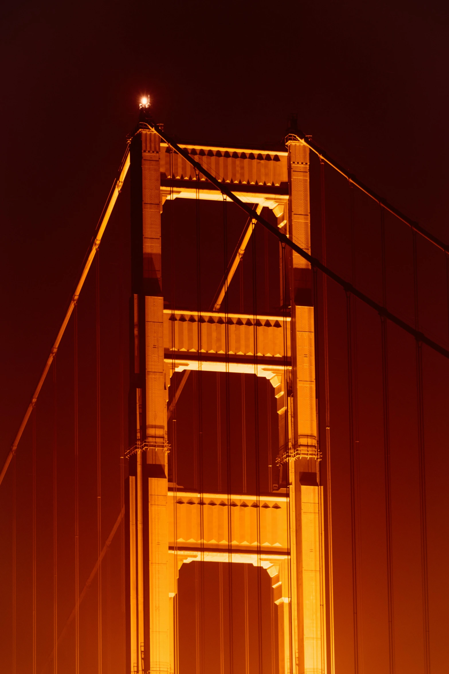 the golden gate bridge is lit up at night, by Dave Melvin, renaissance, kodak photograph, stacked image, vivid)