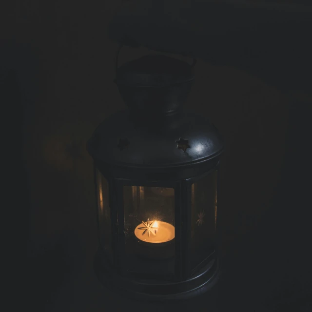 a lit candle in a dark room, lantern, instagram post, lanterns, no lights