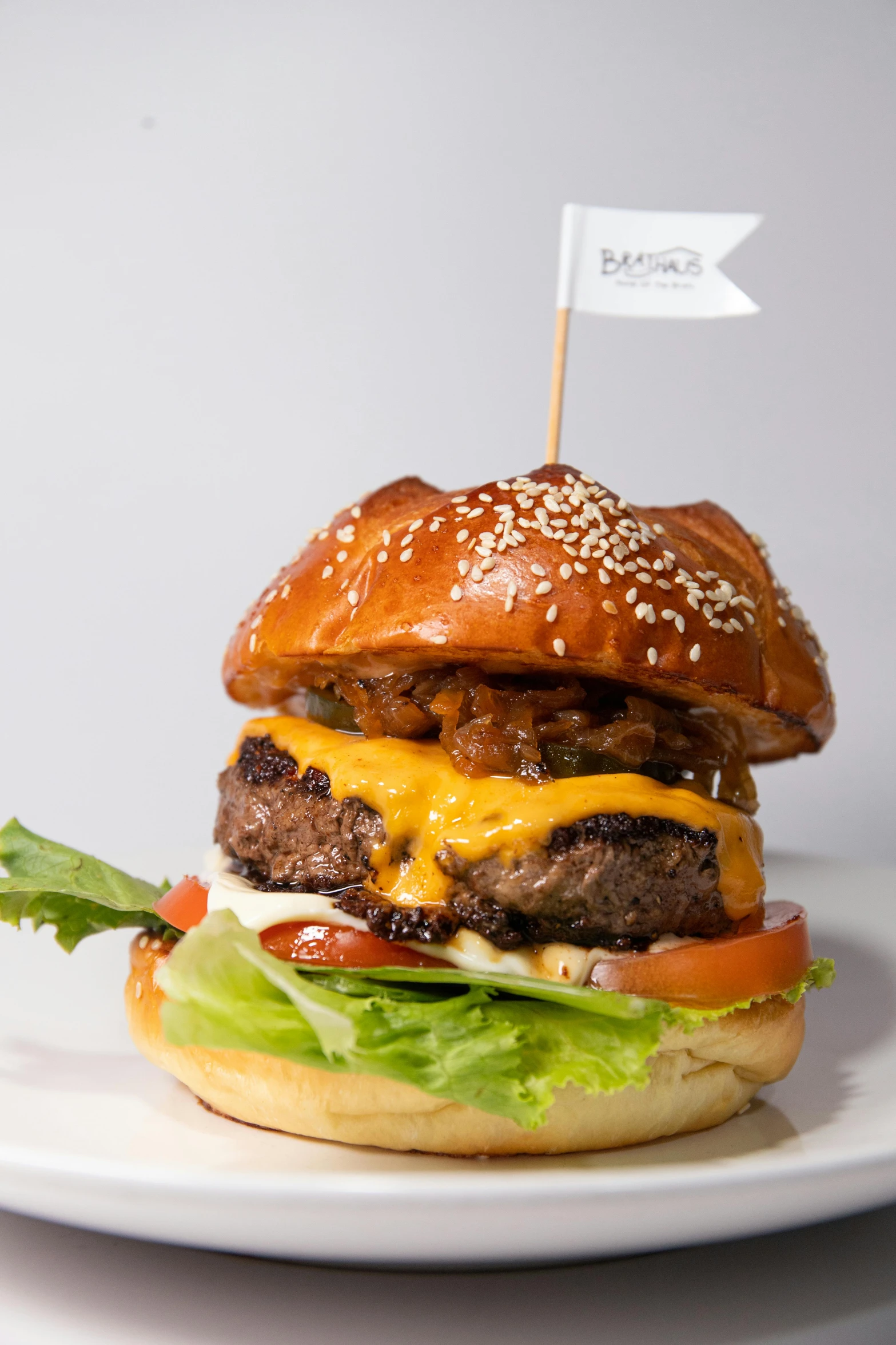 a hamburger sitting on top of a white plate, award-winning crisp details”, mecca, burger with a mouth, 3/4 side view