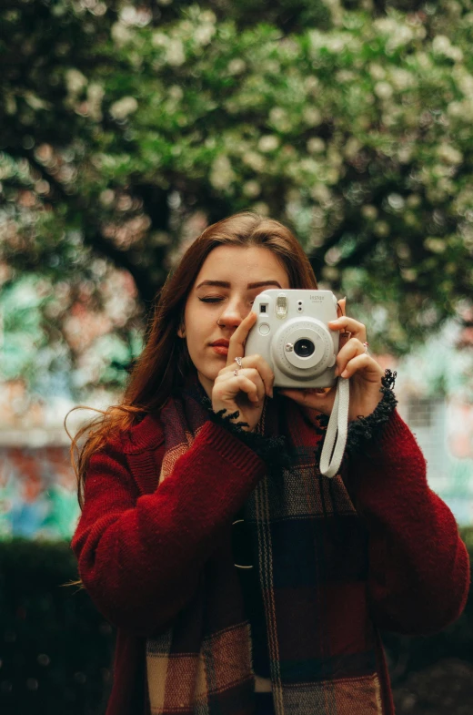 a woman taking a picture with a camera, a picture, inspired by Elsa Bleda, pexels contest winner, dslr photo of a pretty teen girl, 35mm of a very cute, college, with a long