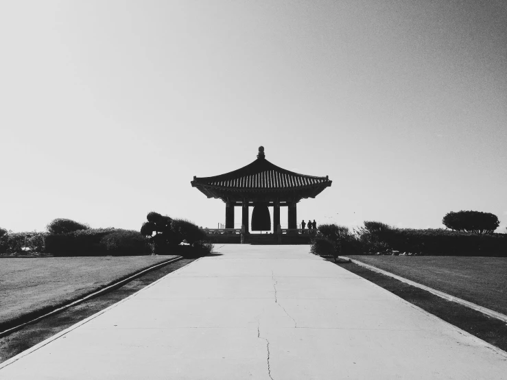 a black and white photo of a pagoda, inspired by Jung Park, unsplash, people walking into the horizon, gardena architecture, sangyeob park, square