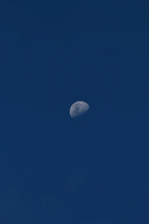 a plane flying in the sky with the moon in the background, by Peter Churcher, postminimalism, 200mm f/2.0, smol, bluish face, apollo 11