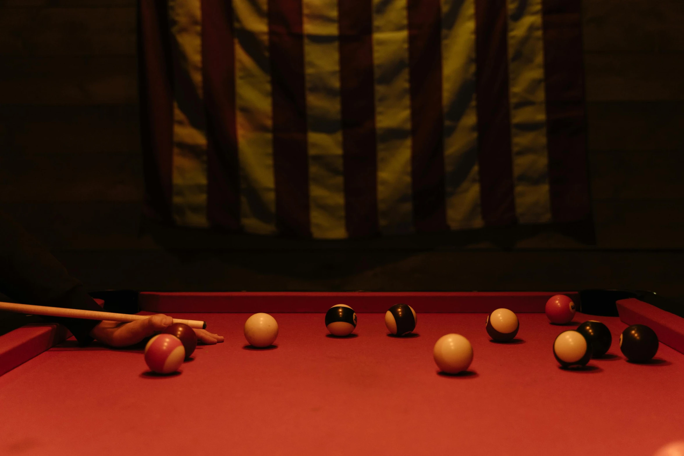 a pool table with balls and cues in front of an american flag, by Elsa Bleda, hyperrealism, red yellow, alessio albi, 7 0 s photo