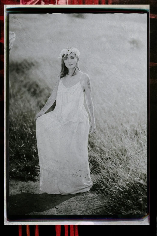 a black and white photo of a woman in a white dress, a black and white photo, 2000s photo, museum picture, young goddess, promo material