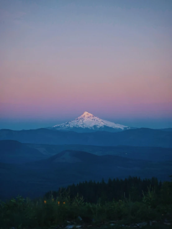 a mountain with a snow capped peak in the distance, by Jacob Burck, unsplash contest winner, portland oregon, slide show, dusk light, profile image