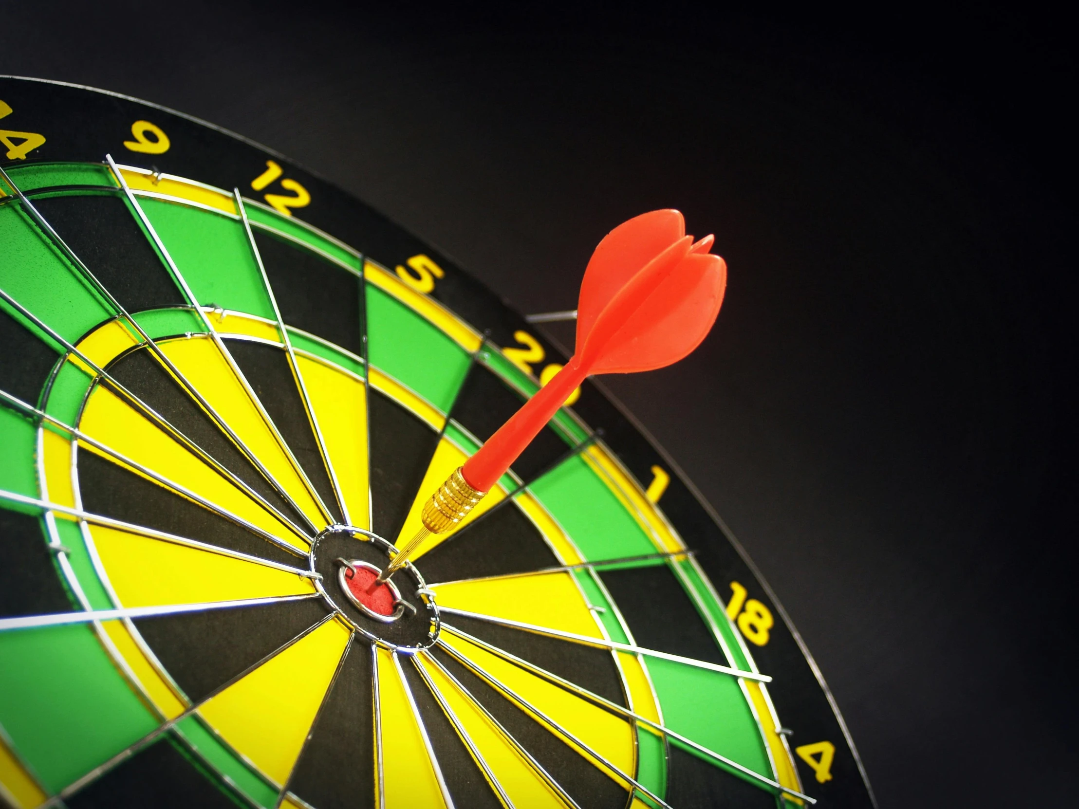 a dart in the center of a dart board, pexels contest winner, rasquache, on grey background, a brightly coloured, in front of a black background, commercial