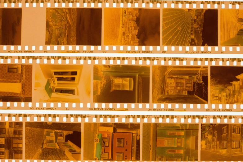 a close up of a film strip with a building in the background, inspired by Raoul Ubac, new mexico with a yellow filter, contact sheet, technicolour film, brown