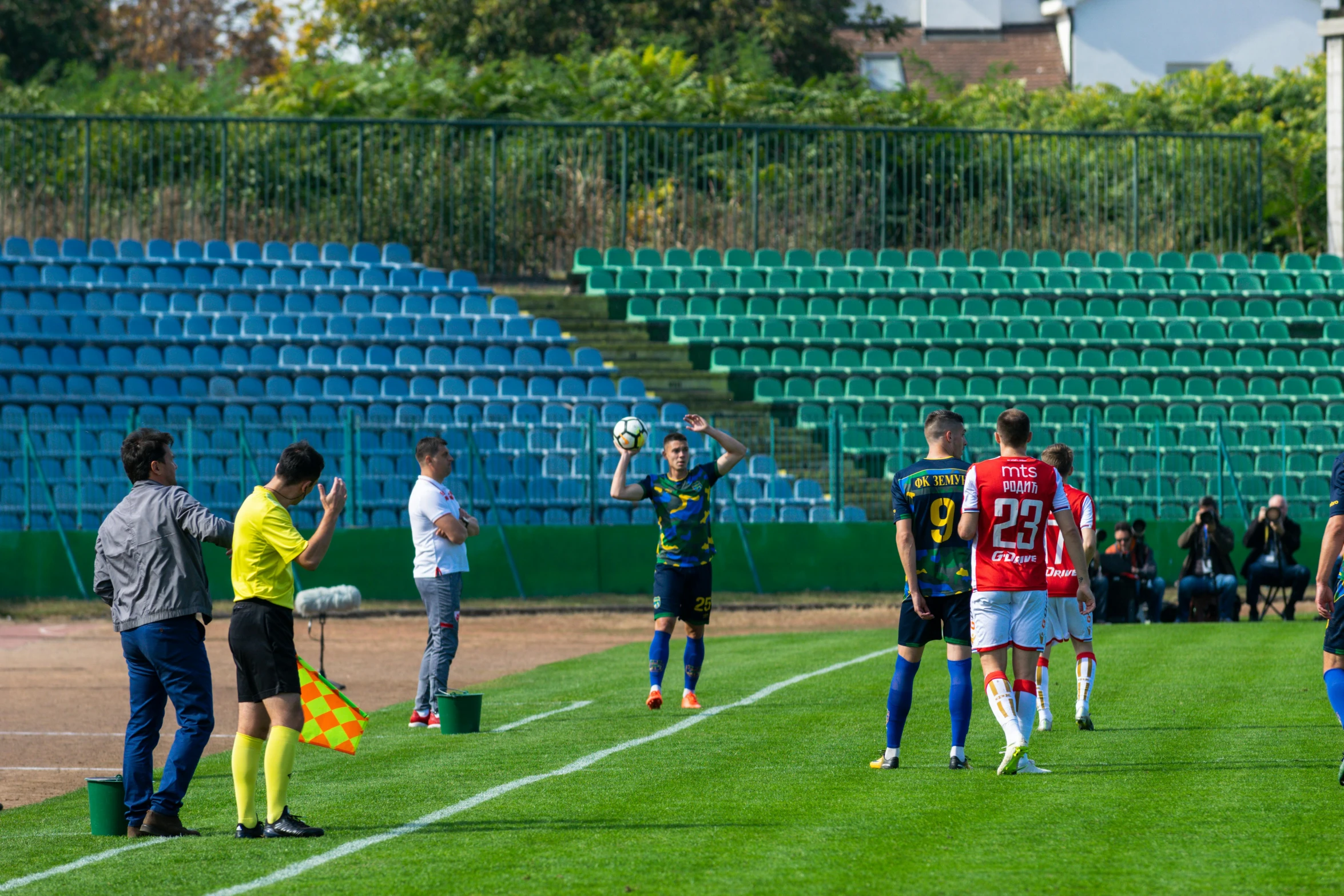 a group of men standing on top of a soccer field, by Julia Pishtar, shutterstock, ukraine. professional photo, square, actors, 15081959 21121991 01012000 4k