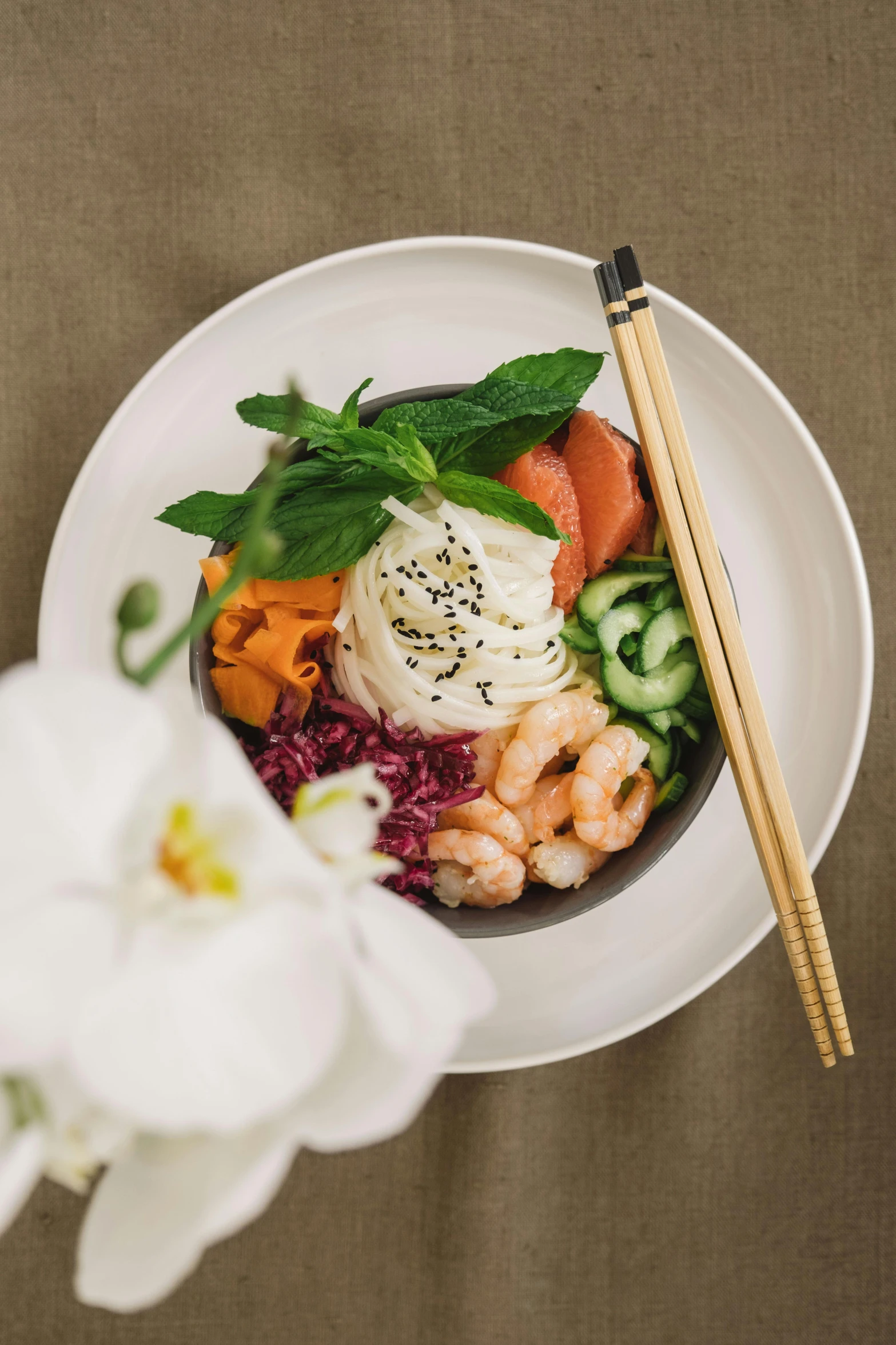 a close up of a plate of food with chopsticks, inspired by Tan Ting-pho, renaissance, bowl of fruit, shrimp, day light, wrapped in cables and flowers