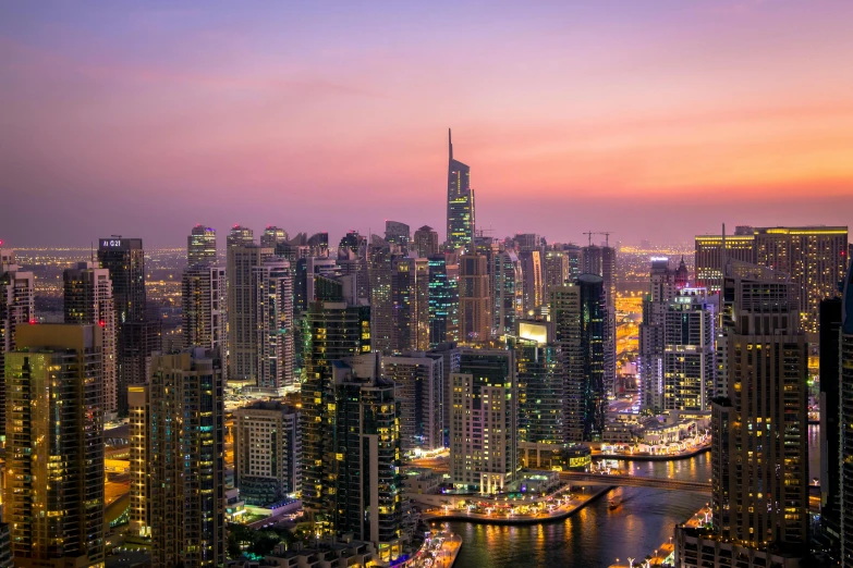 a view of a city at night from the top of a building, pexels contest winner, hurufiyya, gta : dubai, dusk light, multicoloured, youtube thumbnail