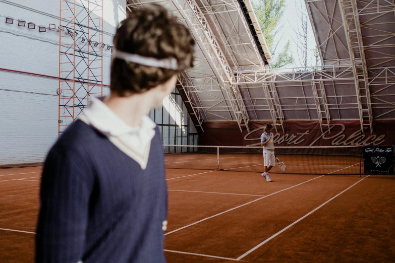 a man standing on a tennis court holding a racquet, an album cover, by Emma Andijewska, pexels contest winner, bauhaus, musee d'orsay 8 k, train with maroon, school class, ignant