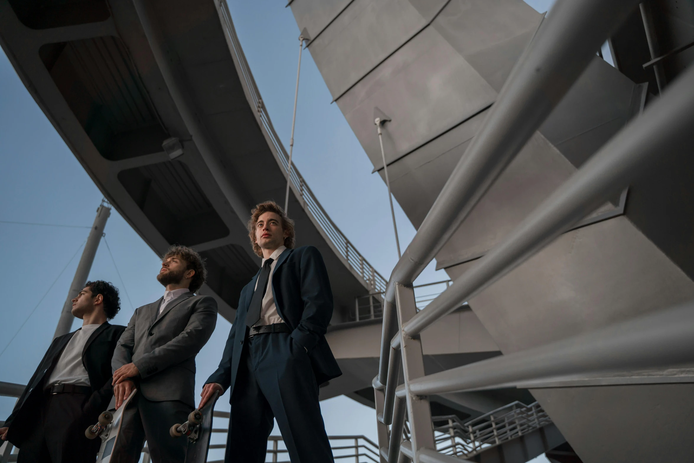 a group of men standing next to each other, pexels contest winner, bauhaus, in a sci-fi shipping port, low angle looking up, wearing a suit, avatar image