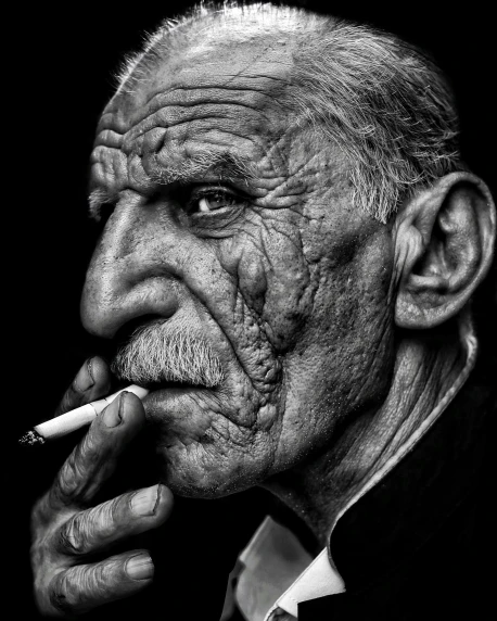 a black and white photo of a man smoking a cigarette, by Lee Jeffries, hyperrealism, wrinkly, kerem beyit, pablo picasso and mark brooks, portrait of an old