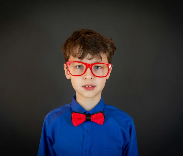 a young boy wearing red glasses and a bow tie, pexels contest winner, incoherents, red and blue neon, 15081959 21121991 01012000 4k, portrait of a young, schools