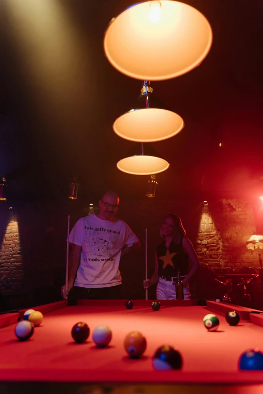 a group of people standing around a pool table, sublime atmosphere, local bar, cool vibes, swimmingpool