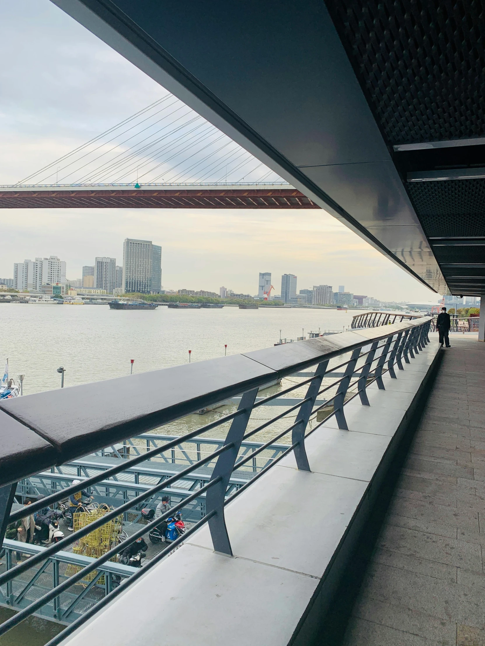 a view of a bridge over a body of water, happening, set in tokyo rooftop, dutch tilt, walkway, very consistent