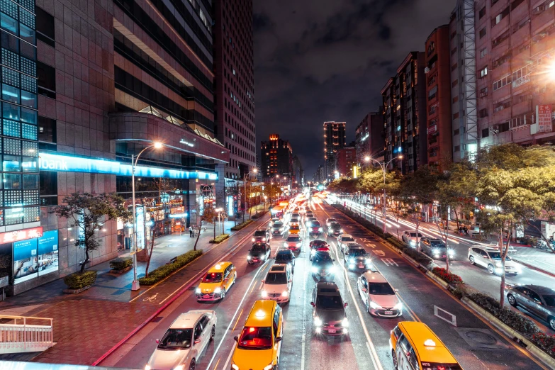 a city street filled with lots of traffic at night, by Alejandro Obregón, pexels contest winner, square, taiwan, high quality image, ad image