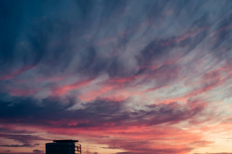 a sky that has some clouds in it, pexels contest winner, city sunset, magenta and crimson and cyan, ash thorp, flattened