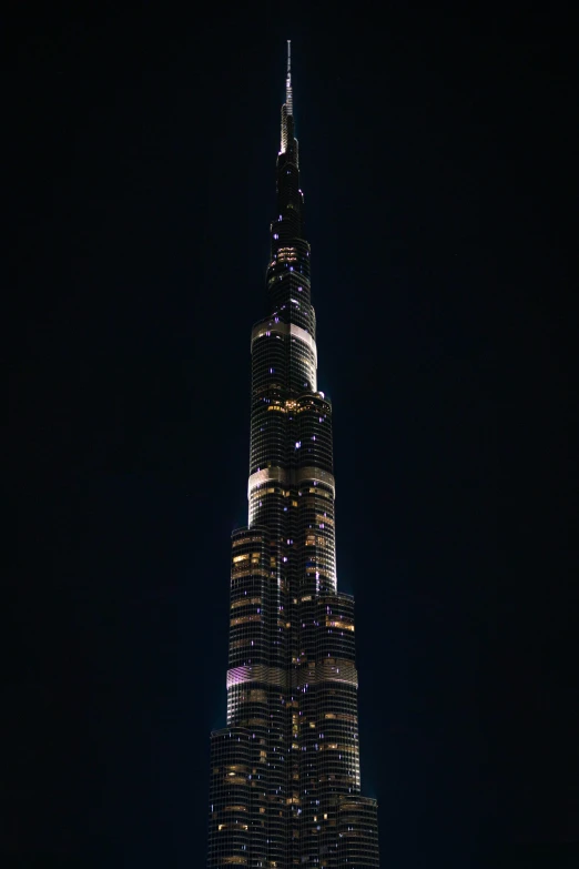 the burjra tower lit up at night, an album cover, 8k 50mm iso 10, towering high up over your view, aaaaaaaaaaaaaaaaaaaaaa, ✨🕌🌙