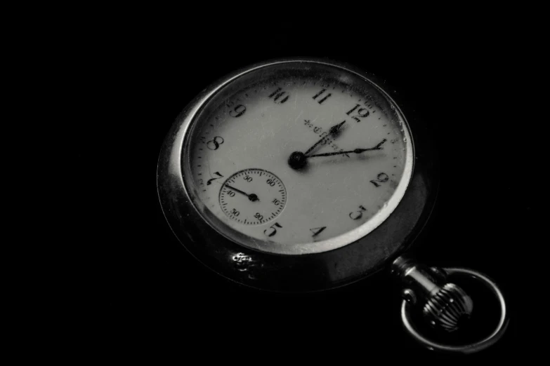 a black and white photo of a pocket watch, by Adam Chmielowski, pixabay, minimalism, 1 8 0 0's, antique photo, uploaded, silver sports watch