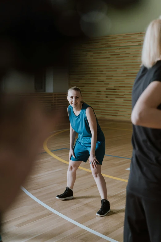 a group of people playing a game of basketball, portrait of sanna marin, high quality upload, origin jumpworks, worried